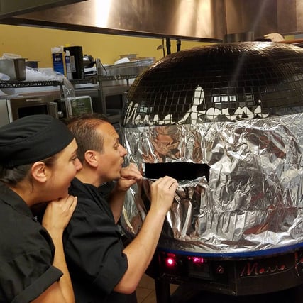 Chefs at Cafe Firenze unwrap Marra Forni Brick Oven