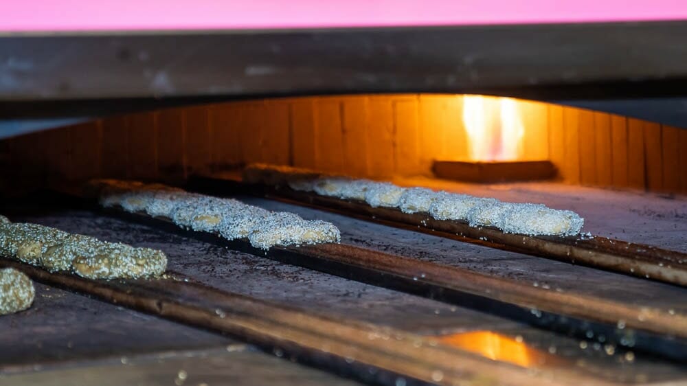 Bagels Baking on wooden sliders In a Pink Marra Forni Brick BagelOven